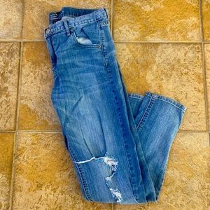 Destroyed light blue jeans